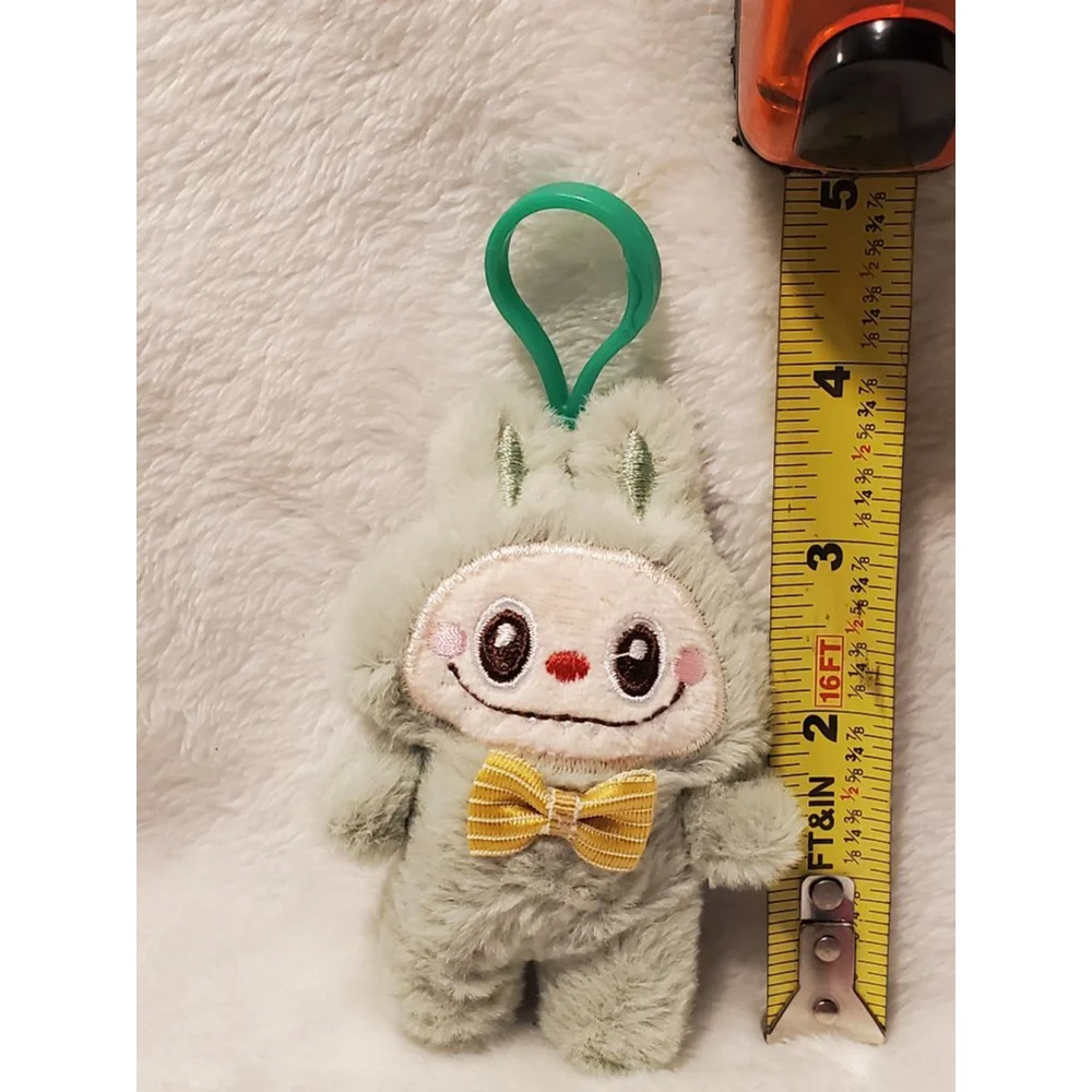 Light Green Labubu stuffed keychain and bag charm featuring a stylish bow tie.